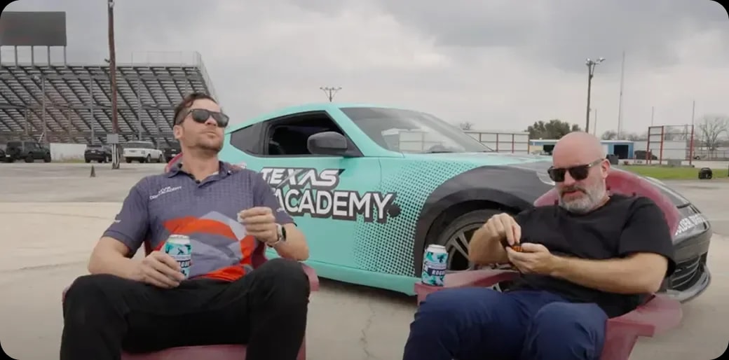 Ton Segura grabbing a Rogue Pouch on the racetrack